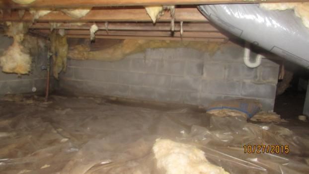 Before a completed sealing crawl space project in the  area